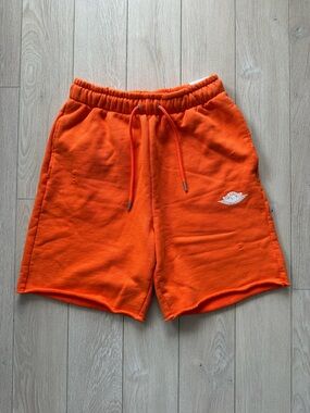 NWT Air Jordan Rare Air French Terry Shorts Men’s Brilliant Orange/Sail Size S